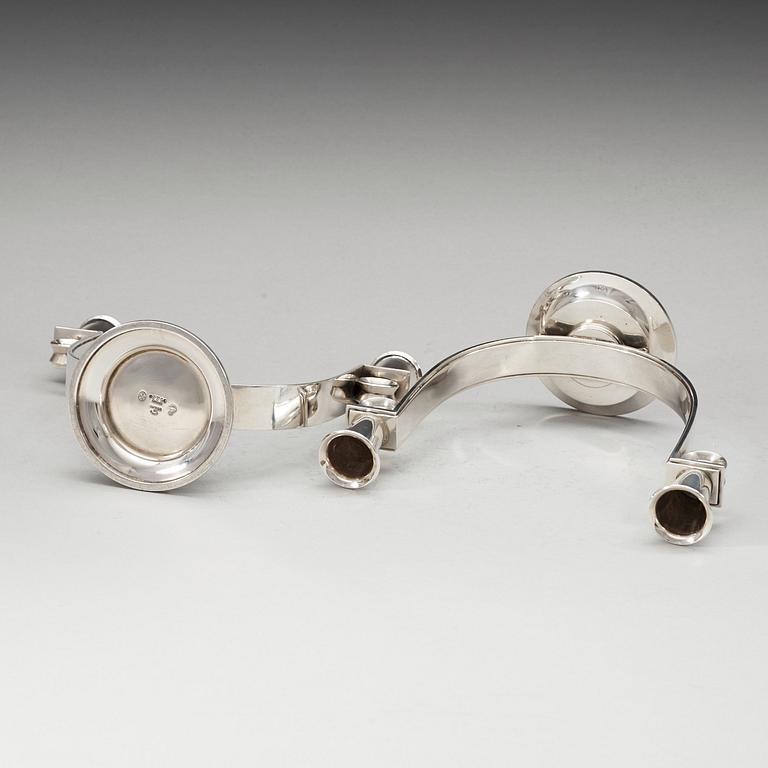A pair of Gunlach Pedersen sterling candelabra, Georg Jensen, Copenhagen 1925-32, design nr 623.