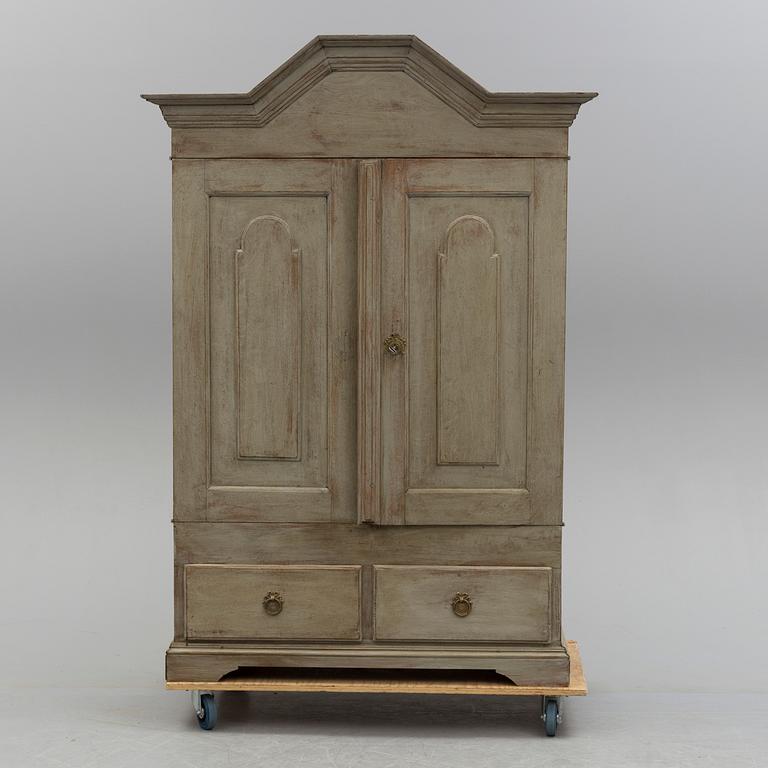 A 19th century late baroque cabinet.