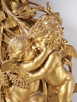 A presumably Dutch Louis XIV carved giltwood frame with mirror glass, in the style of Jean Le Pautre, late 17th century.