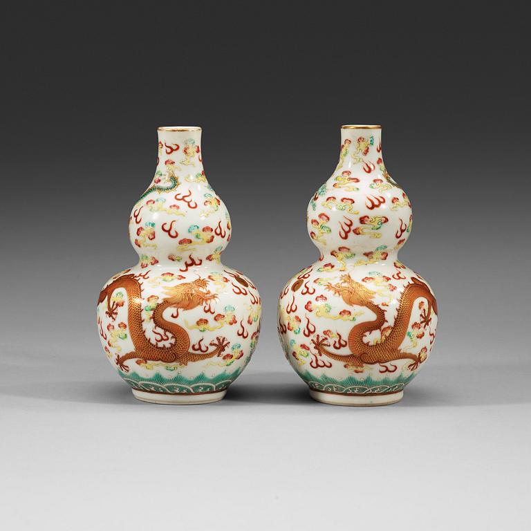 A pair of dragon vases, Republic (1912-49), with Qianlong and Guangxu six character mark.