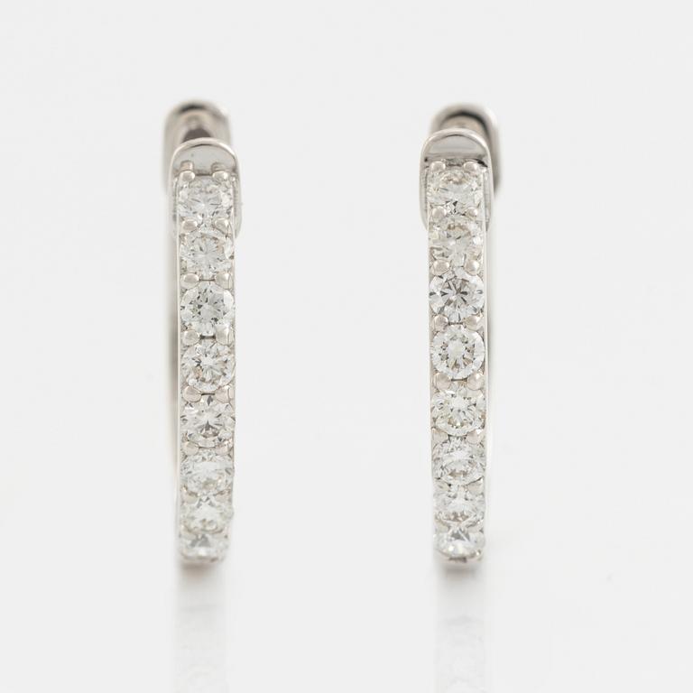 Brilliant cut diamond hoop earrings, total 0,58 ct.
