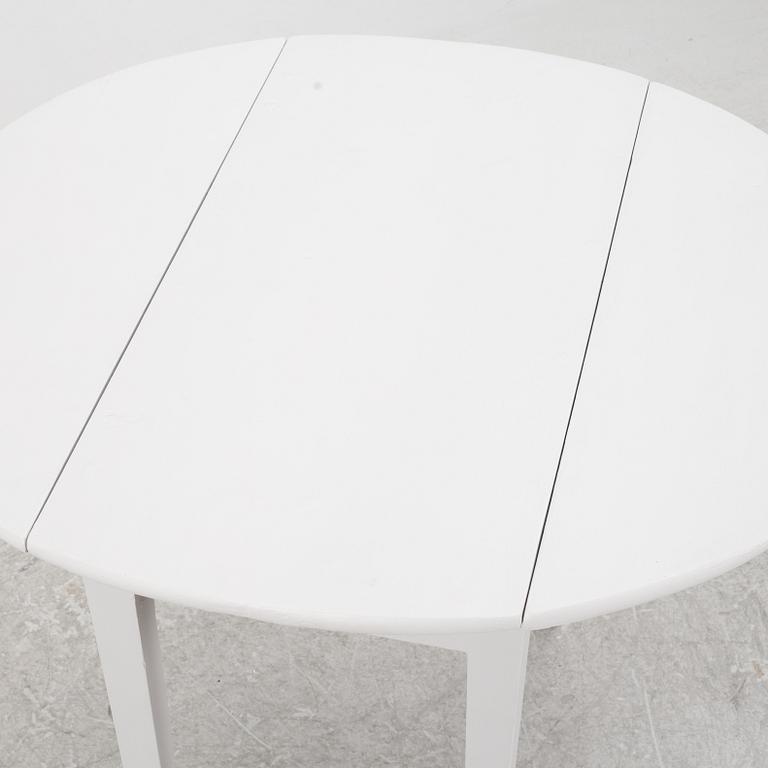 A drop-leaf table, late 19th Century.