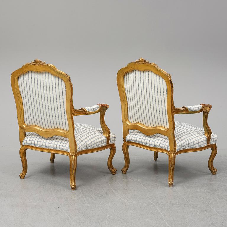 A pair of neo-rococo easy chairs, late 19th century.