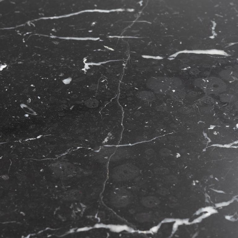 Louise Roe, a 'Roundabout' dining table with marble top.