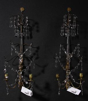 VÄGGLYSTRAR ett par, sengustaviansk stil. 1900-tal.