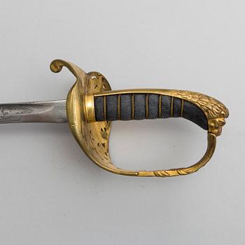 A second half of the 19th century sabre with scabbard.