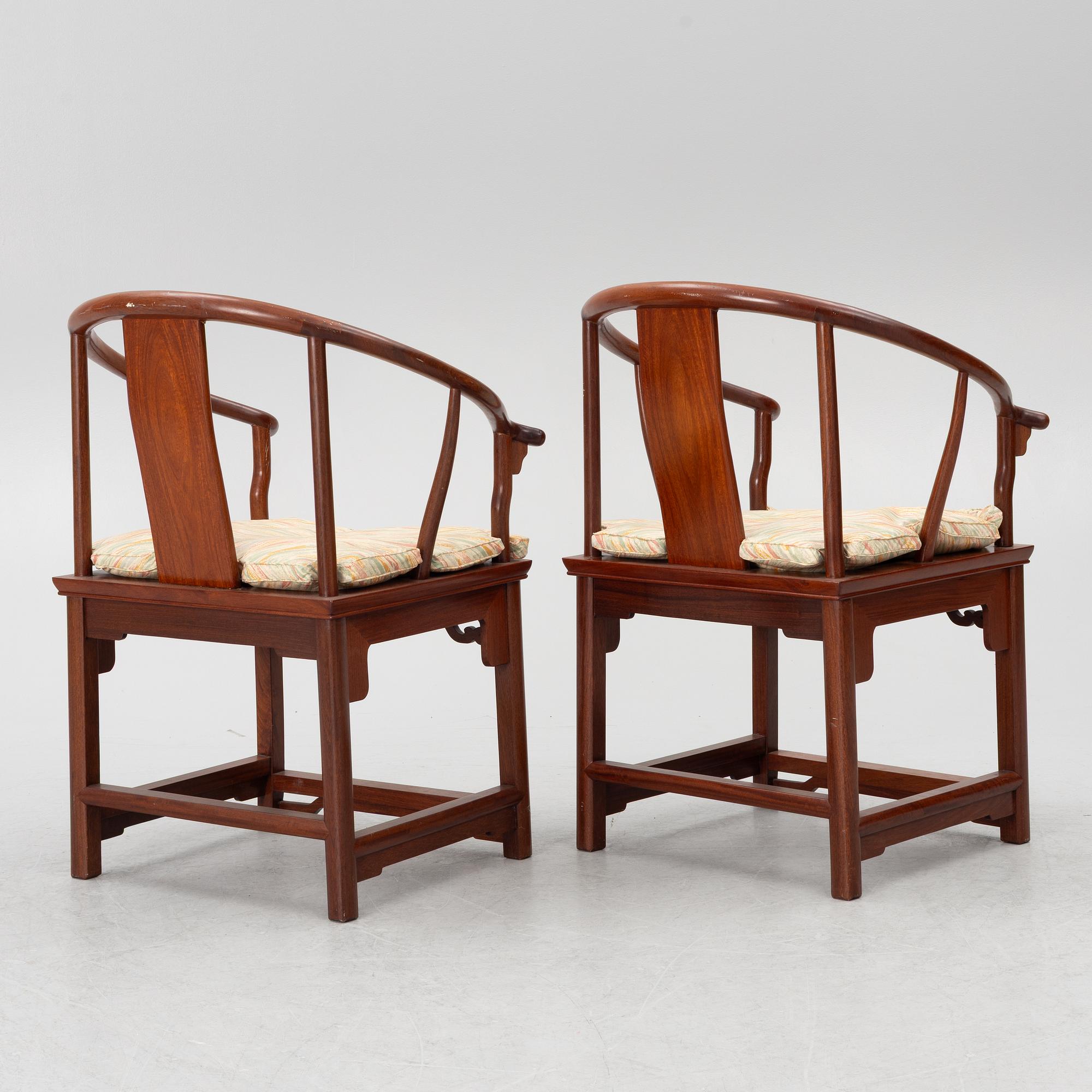A pair of hardwood 'horse shoe back' hardwood armchairs, Hong Kong, 1960s.