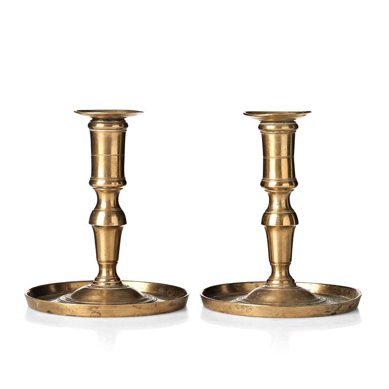 Two Gustavian late 18th century candlesticks.