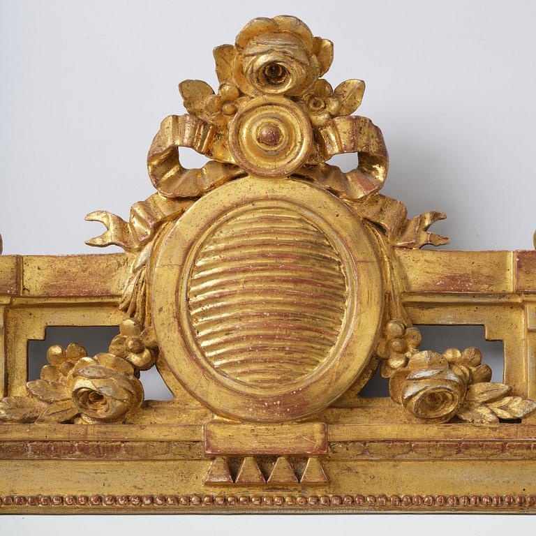 A Gustavian giltwood mirror by J. Åkerblad (master in Stockholm 1758-99).