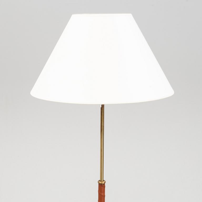 A model 2326 floor light by Josef Frank for Firma Svenskt Tenn.