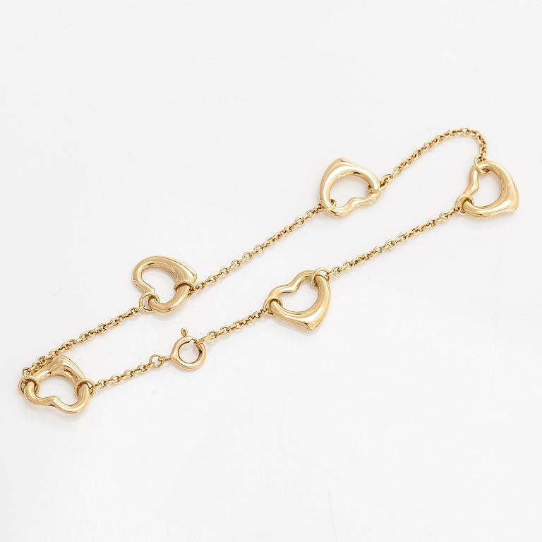 Tiffany & Co, Elsa Peretti, an 18K gold 'Open Heart' bracelet.