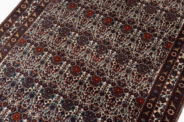 An antique/semi-antique Abadeh rug, Western Iran, c. 202 x 150 cm.