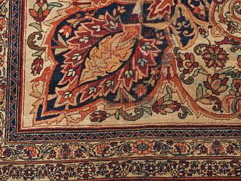 A carpet, an antique Kerman Laver, ca 677-688,5 x 510,5-526 cm.