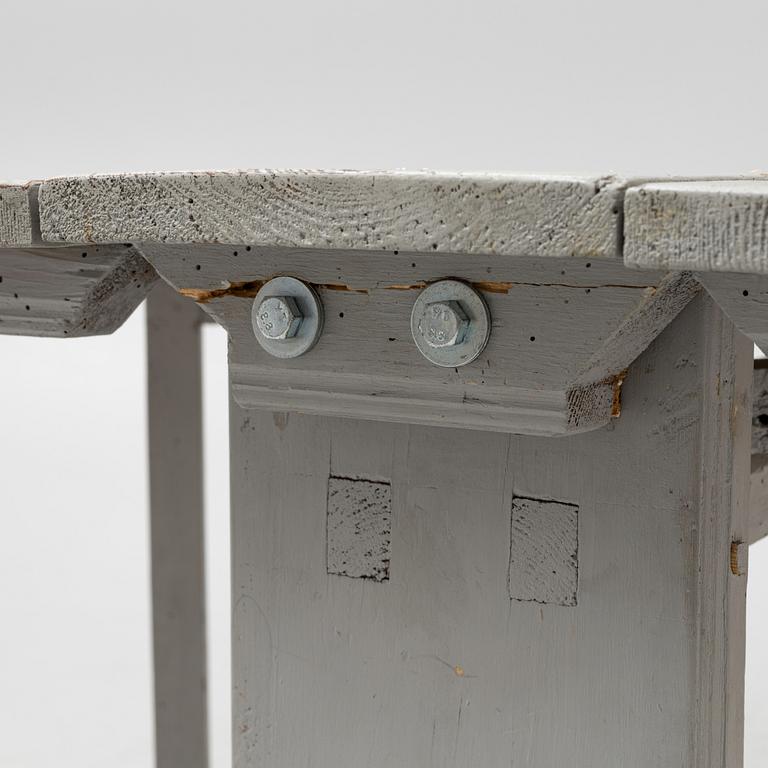 A 19th century gate-leg table.