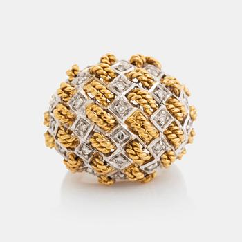 An 18K gold ring set with eight-cut diamonds.