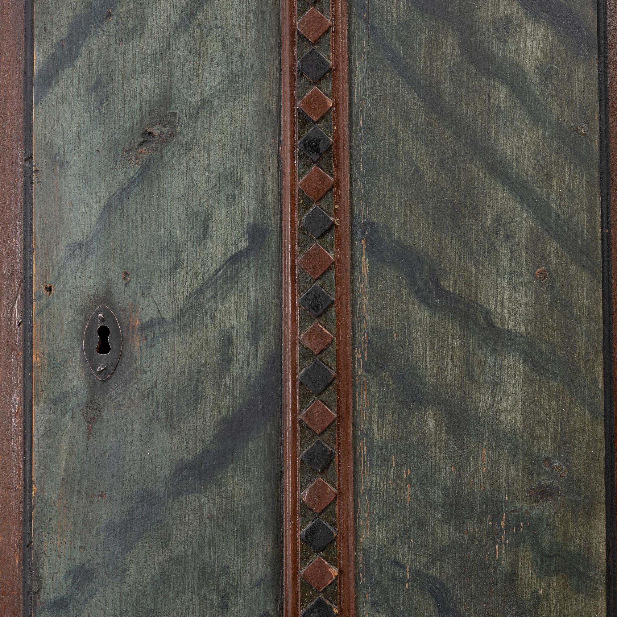 A corner cupboard, probably Värmland, dated 1822.