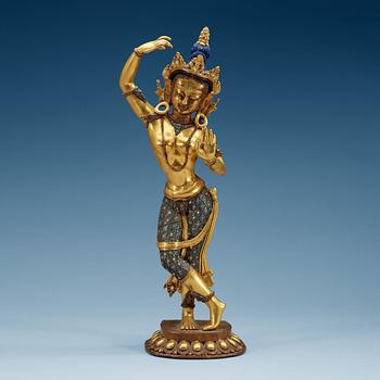 A gilded and silver plated bronze figure of standing Tara, Nepal, presumably early 20th Century.