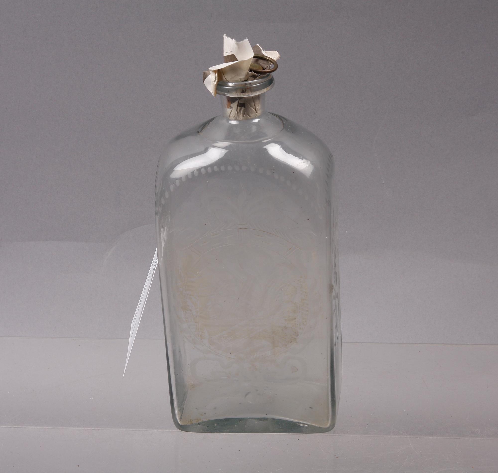 BRÄNNVINSFLASKA, glas, möjligen Cedersberg, dat 1827.