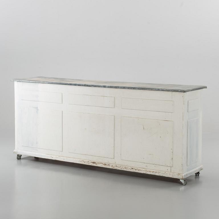 KÖPMANSDISK, 1900-talets mitt,