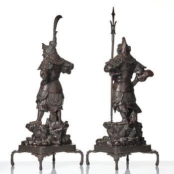 A pair of Japanese bronze guardians, Meiji period (1868-1912).