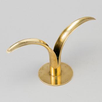 Two pair of 'Liljan' brass candlesticks by Ivar Ålenius-Björk, Ystad Metall, second part of the 20th century.