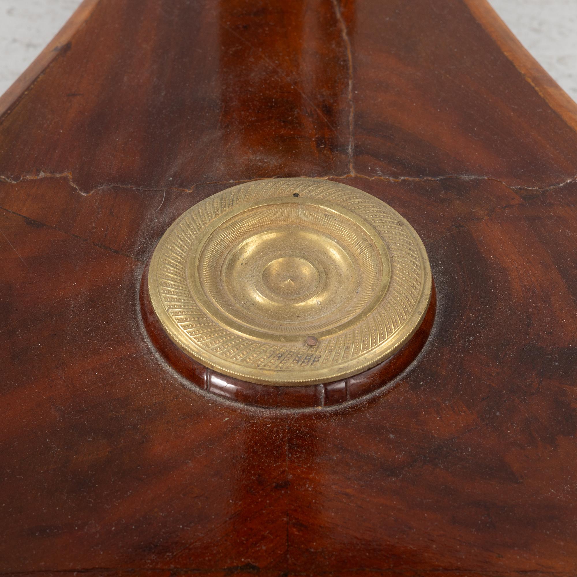 A Empire table, 19th Century.