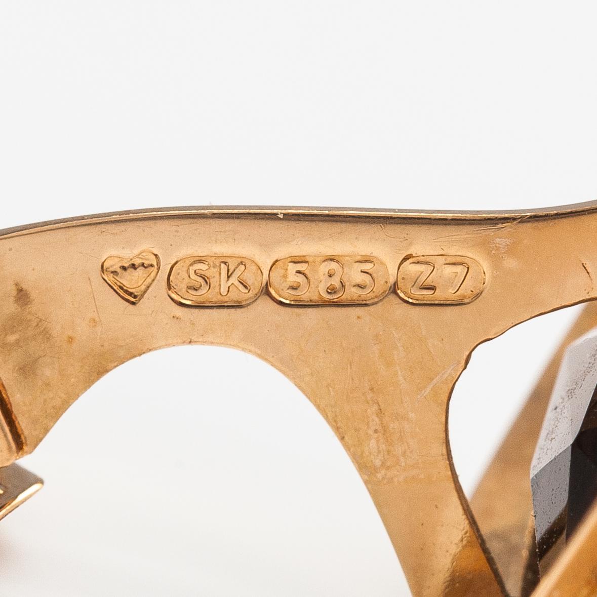 A pair of 14K gold cufflinks with smoaky quartzes. Liitola & Koistinen kultasepät, Turku 1977.