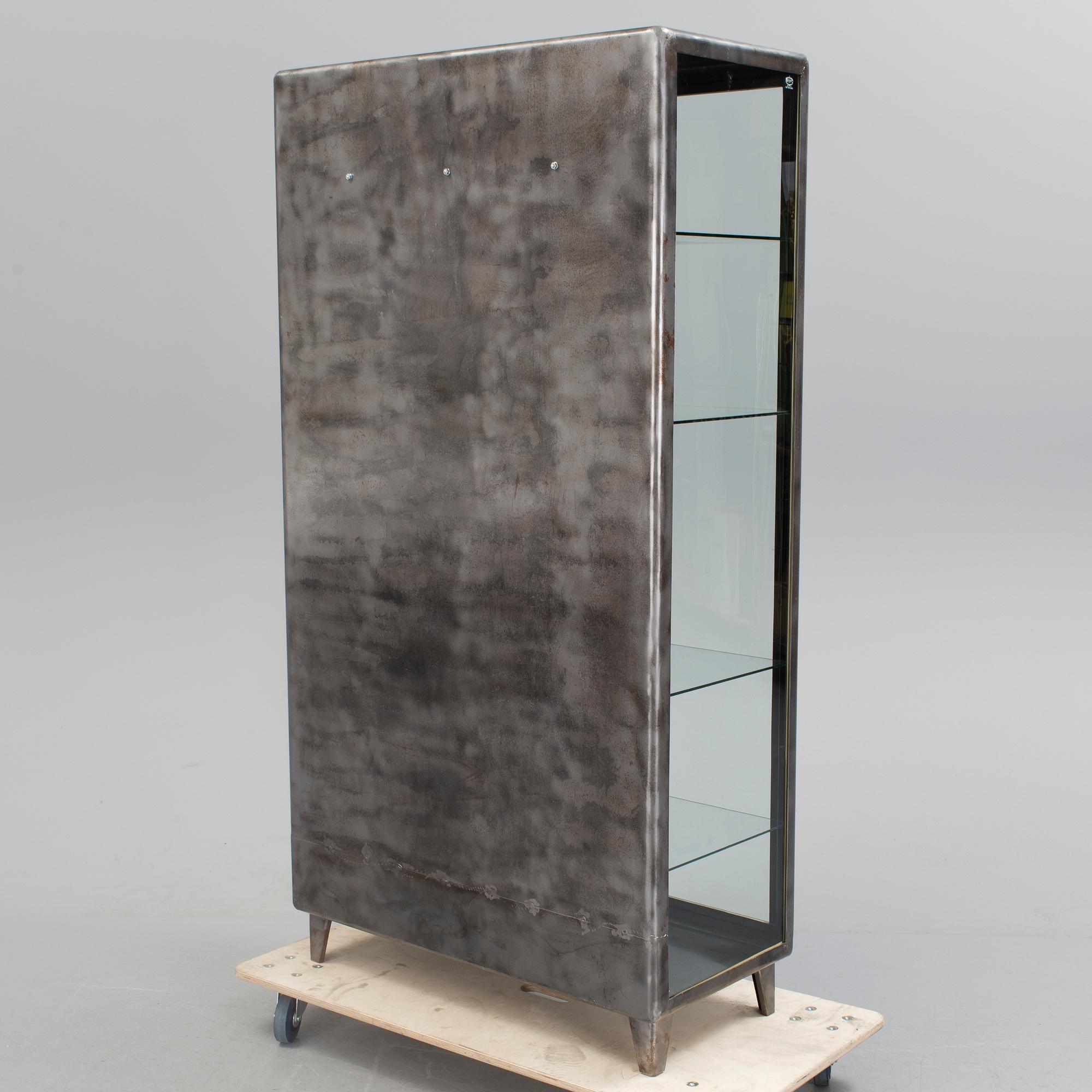 A glazed cabinet, second half of the 20th Century.