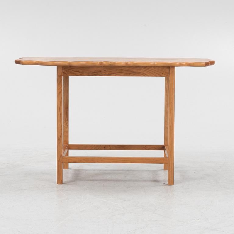 Josef Frank, an elm root top model 1058 coffee table from Firma Svenskt Tenn.
