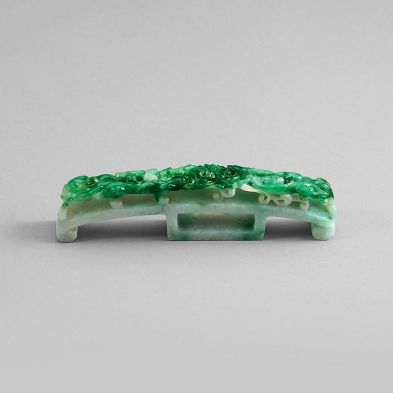 A Chinese carved jadeite belthook, 20th Century.