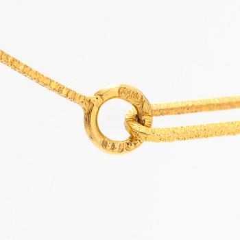 Björn Weckström, An 18K gold necklace "Diamondbud" with an eight-cut diamond ca 0.02 ct. Lapponia 1982.