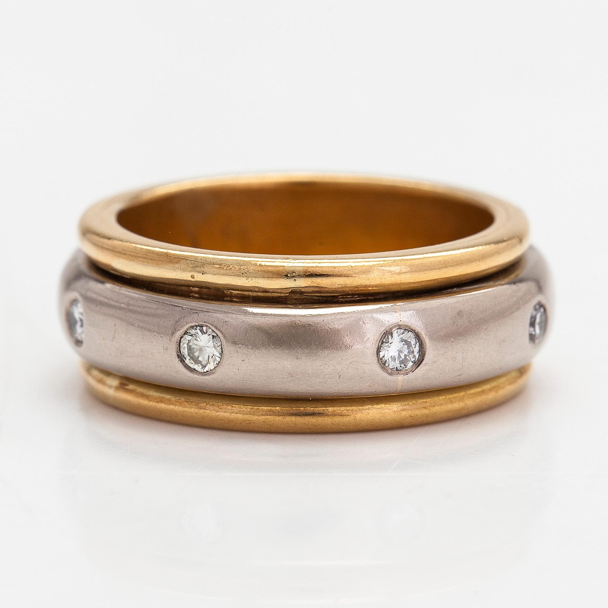 An 18K white/yellow gold ring, diamonds totalling approximately 0.24 ct. Henri Pitkänen, Helsinki.