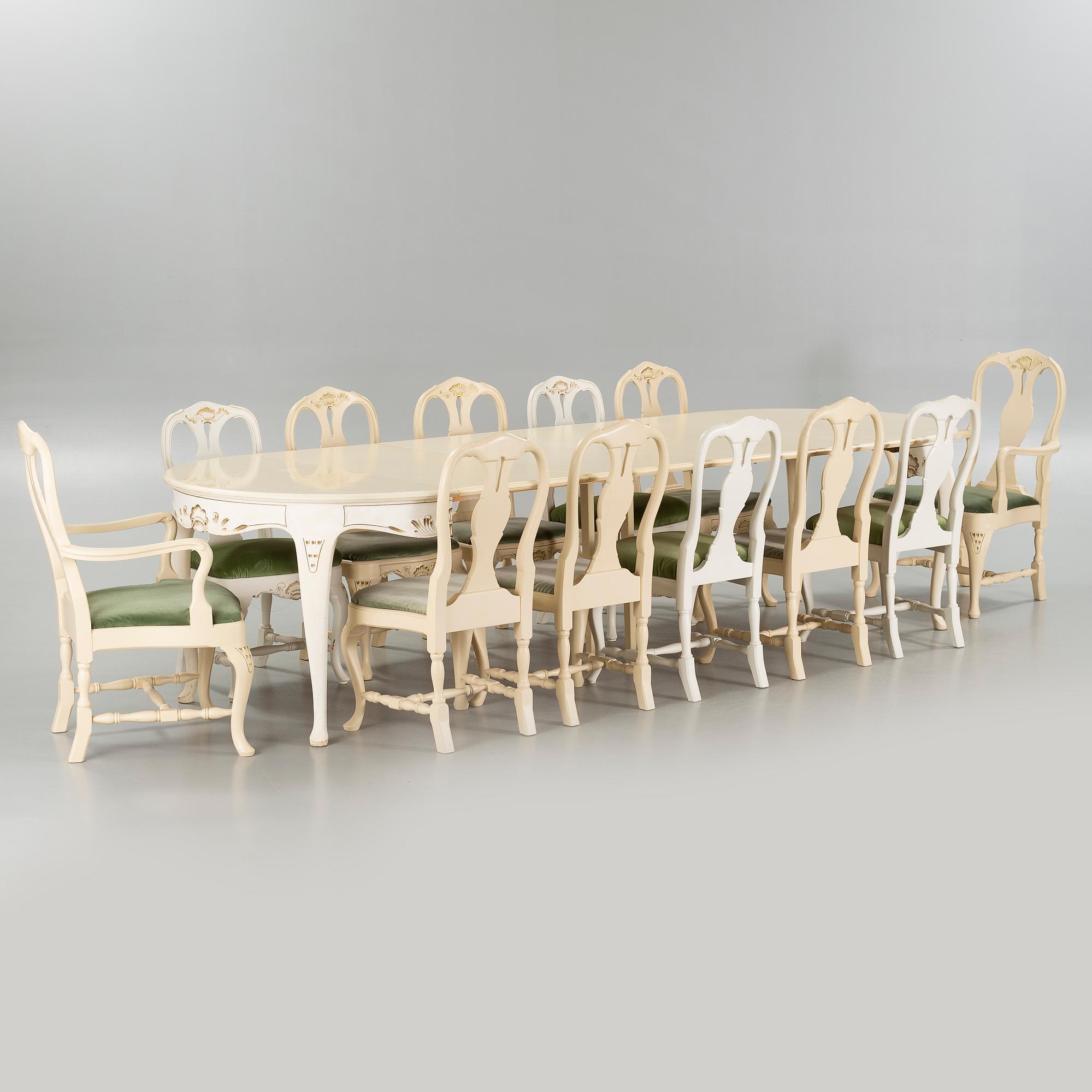A rococo style table and twelve similar chairs, around the mid 20th century.