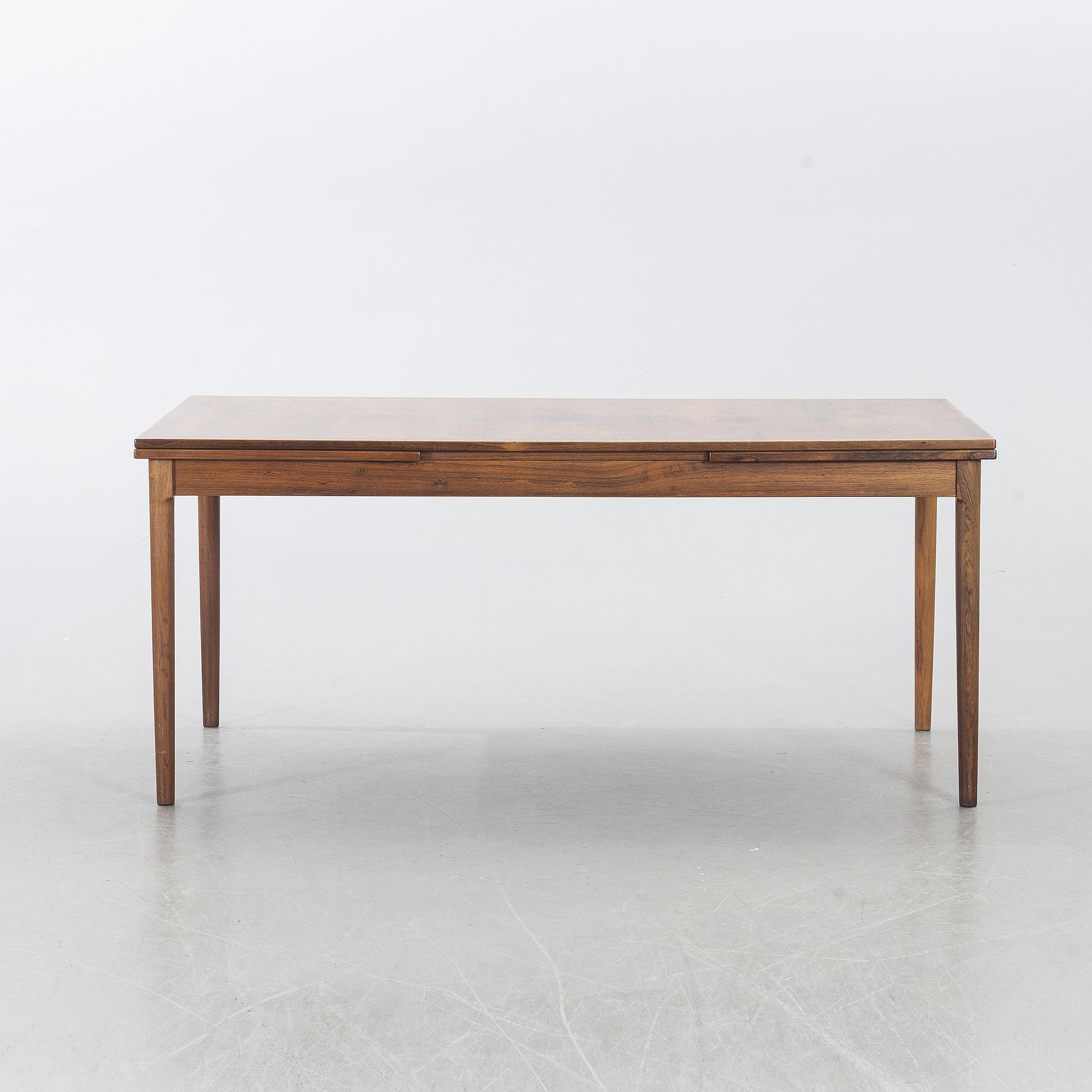 A Table from Slagelse Möbelvaerk A/S and 4 chairs, Niels Otto Møller, JL Møller. Denmark, 1960's.