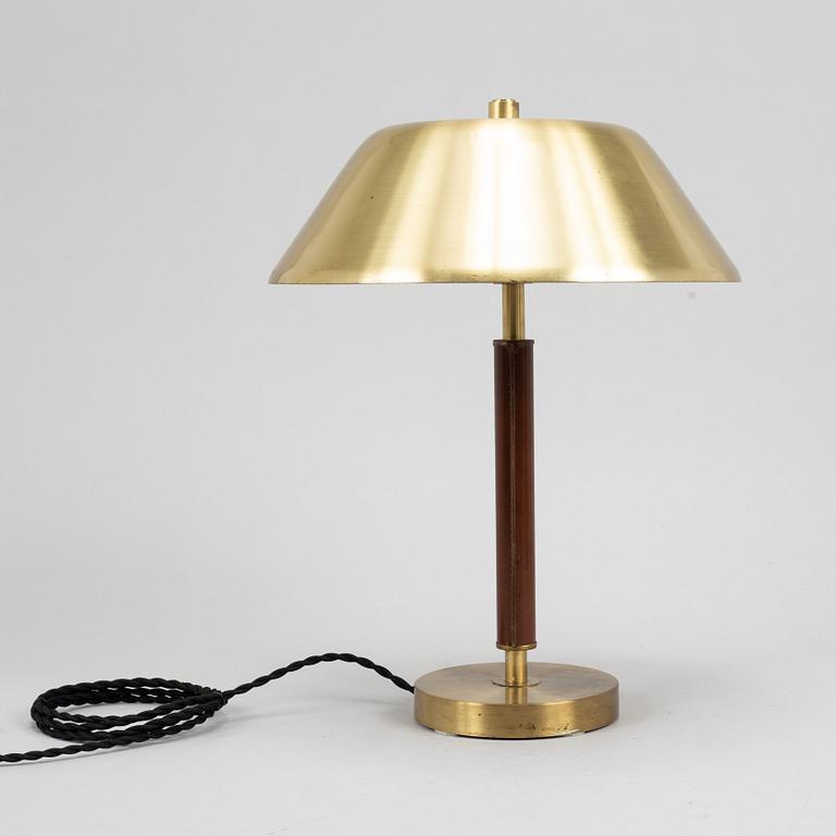 A brass table lamp from Falkenbergs belysning, second half of the 20th century.