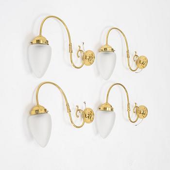 Four brass wall lights, second half of the 20th Century.