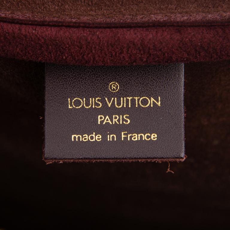 Louis Vuitton, 'Taiga Kendall PM' Bag.