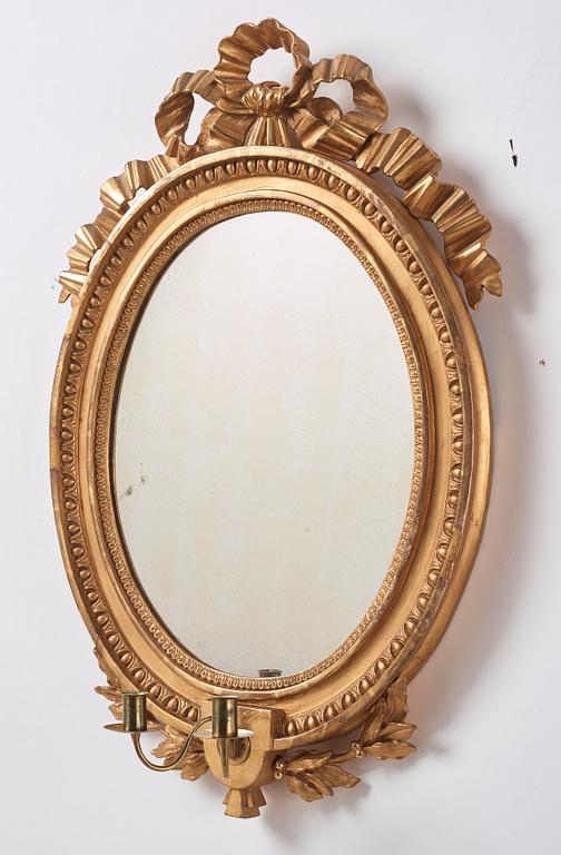 A Gustavian two light girandole mirror. (later copy will follow the lot).
