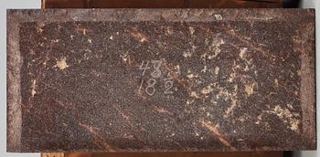 A Swedish Empire 19th century writing commode with porphyry top.