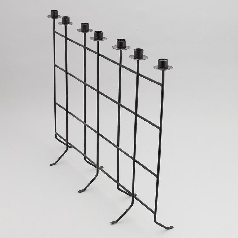 An iron candlestick, second half of the 20th Century.