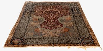 An antique silk rug, probably Istanbul, Turkey, c. 181 x 127 cm.