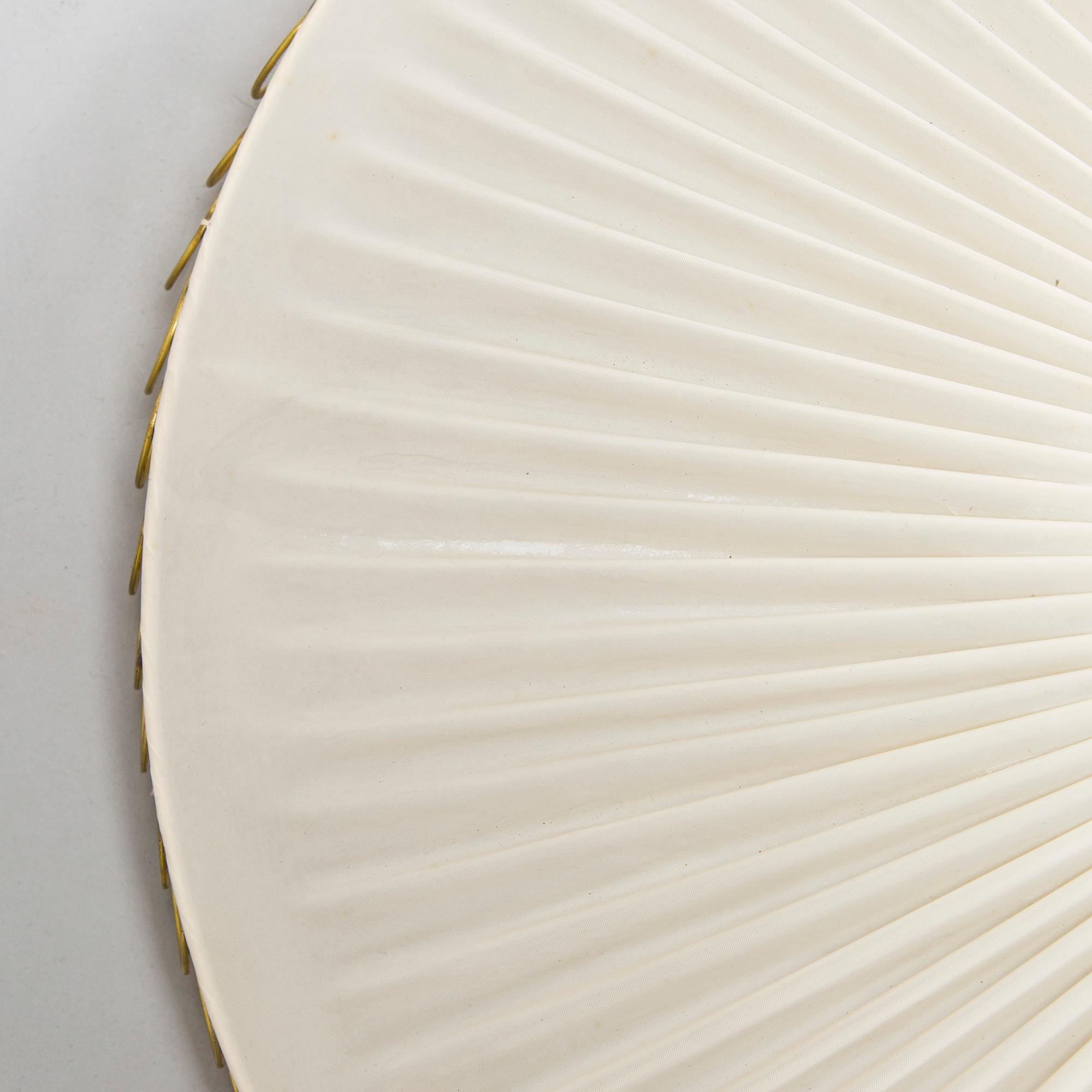 A mid-20th century ceiling light by Valinte.