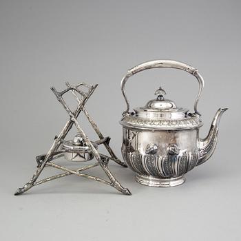 A 20th century tea pot on stand by Walker & Hall, Sheffield, England.