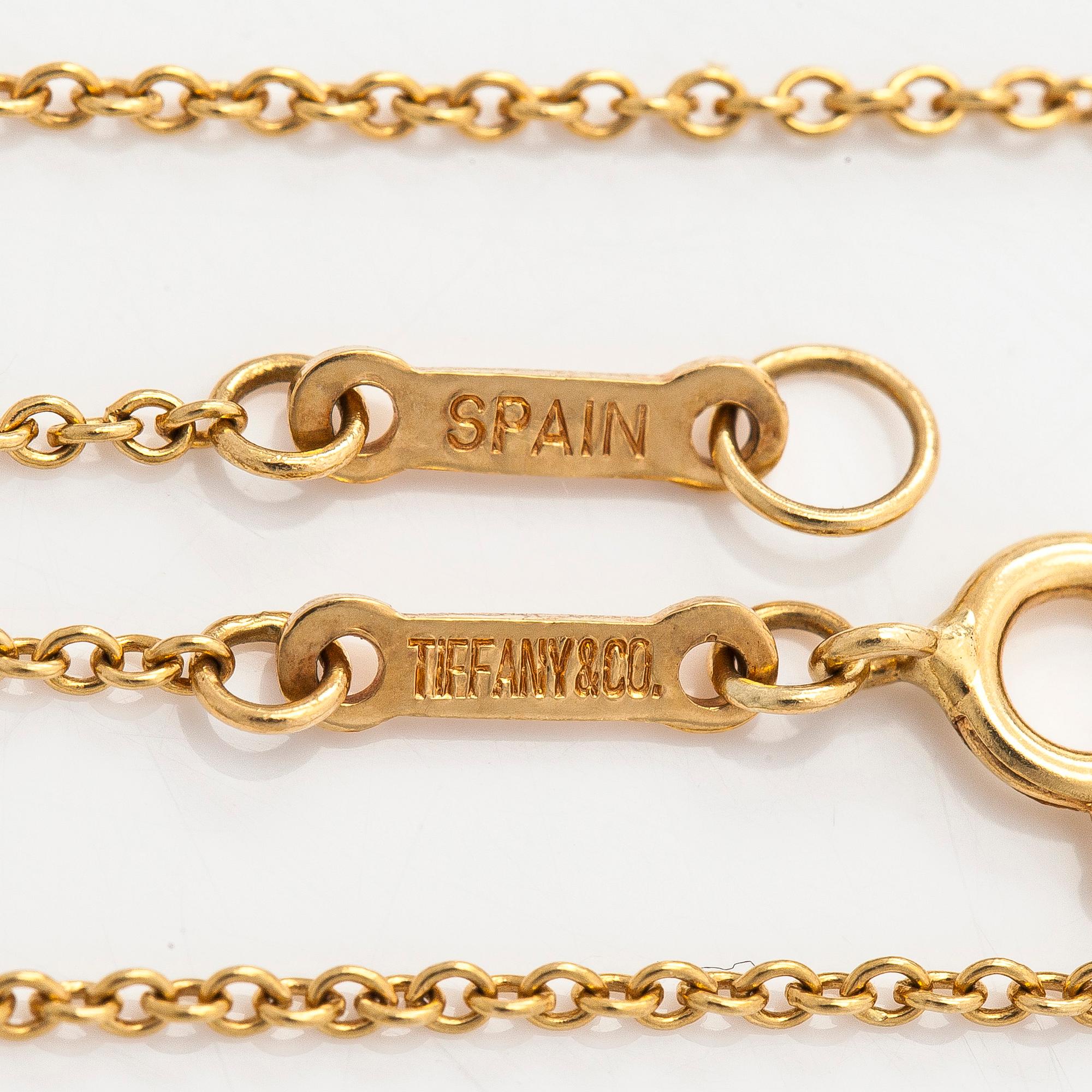 Tiffany & Co, Elsa Peretti, an 18K gold 'Open Heart' necklace.