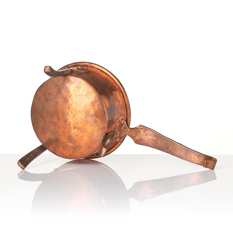 A copper saucepan, 18th century.