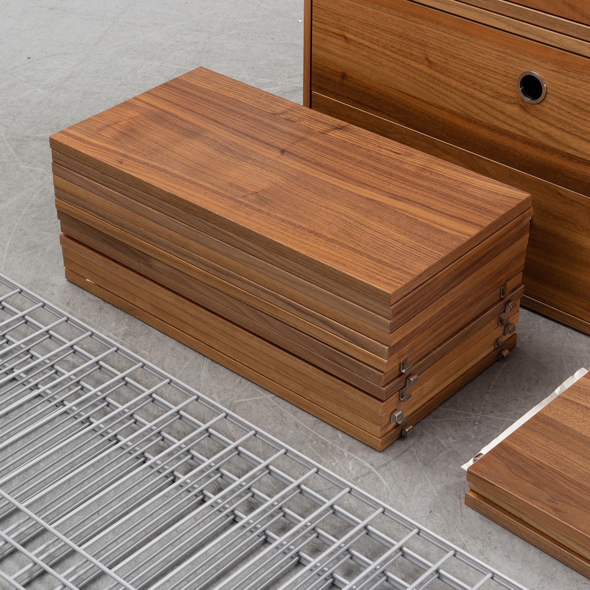 A 'String' shelving system by Nils Strinning, 21st Century.