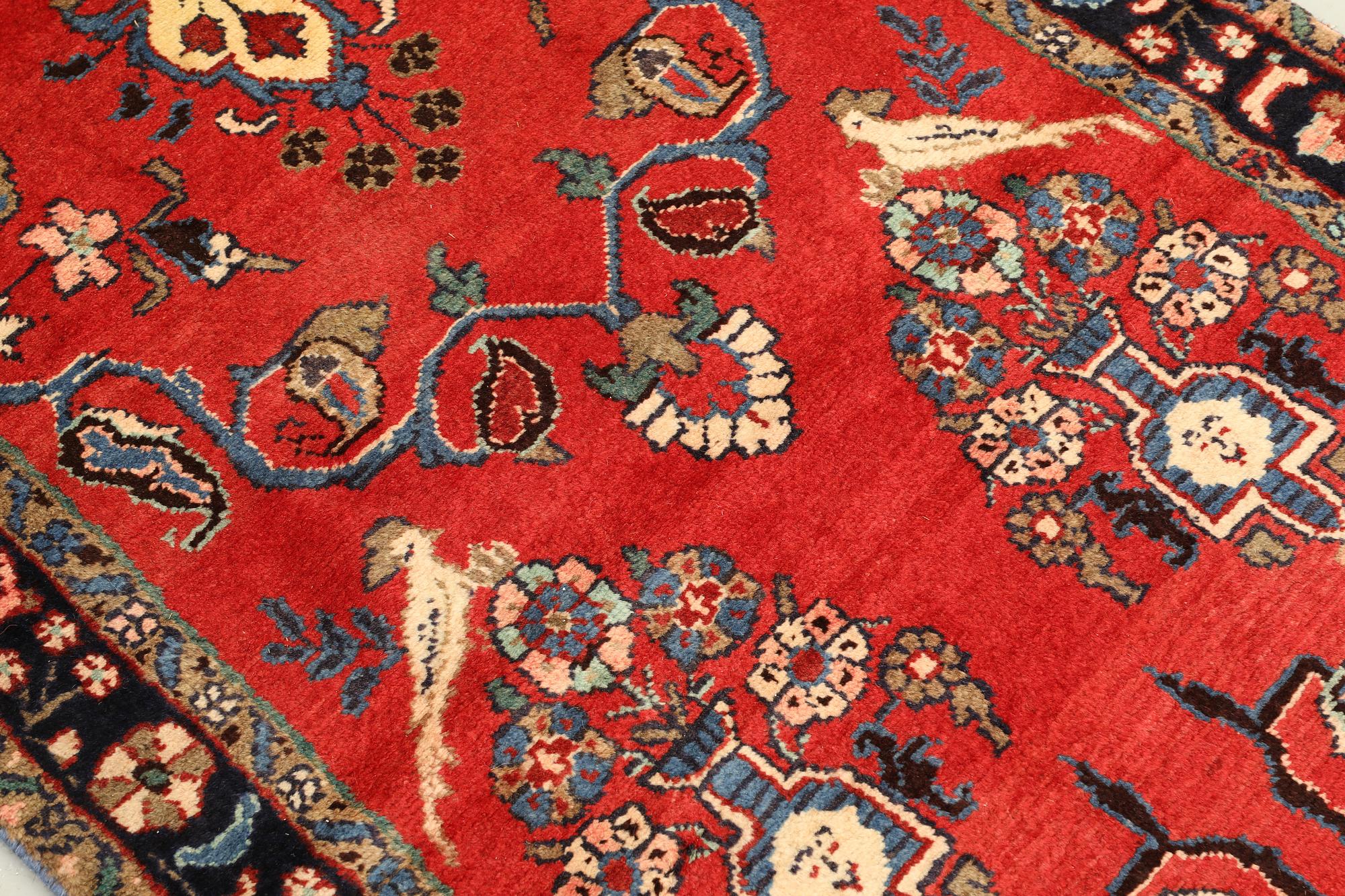 A Figural Hamadan runner carpet, 515 x 90 cm.