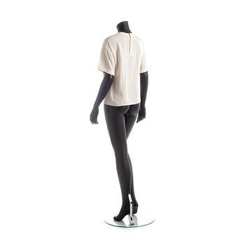 CHANEL, a white silk shirt.