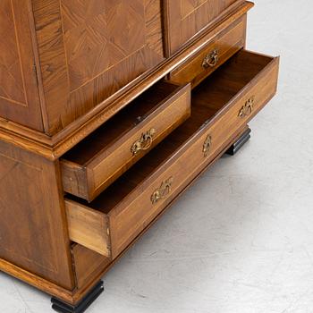 A late Baroque oak cabinet, first part of the 18th Century.