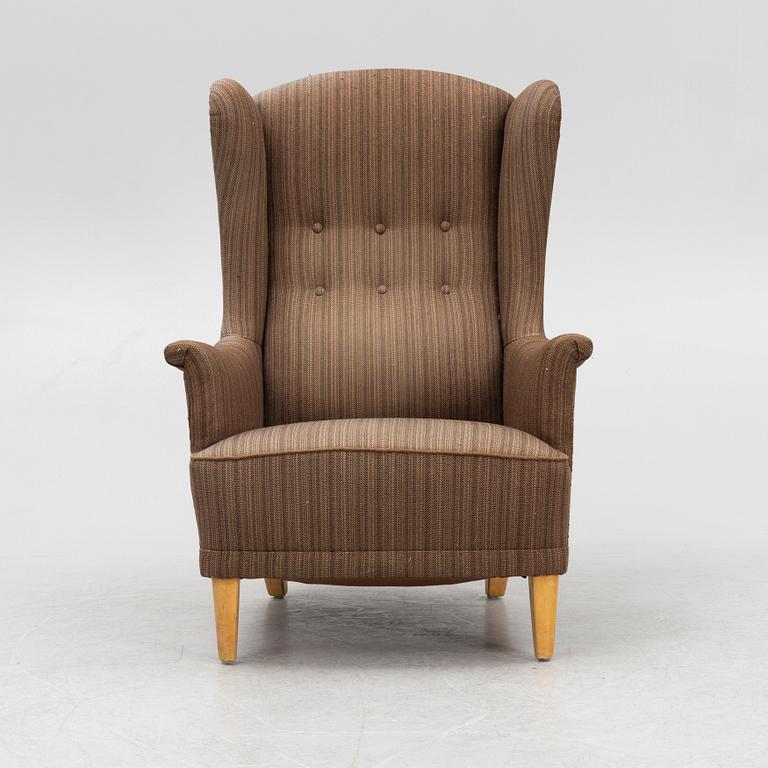 Carl Malmsten, an 'Åldermannen' armchair, second half of the 20th Century.